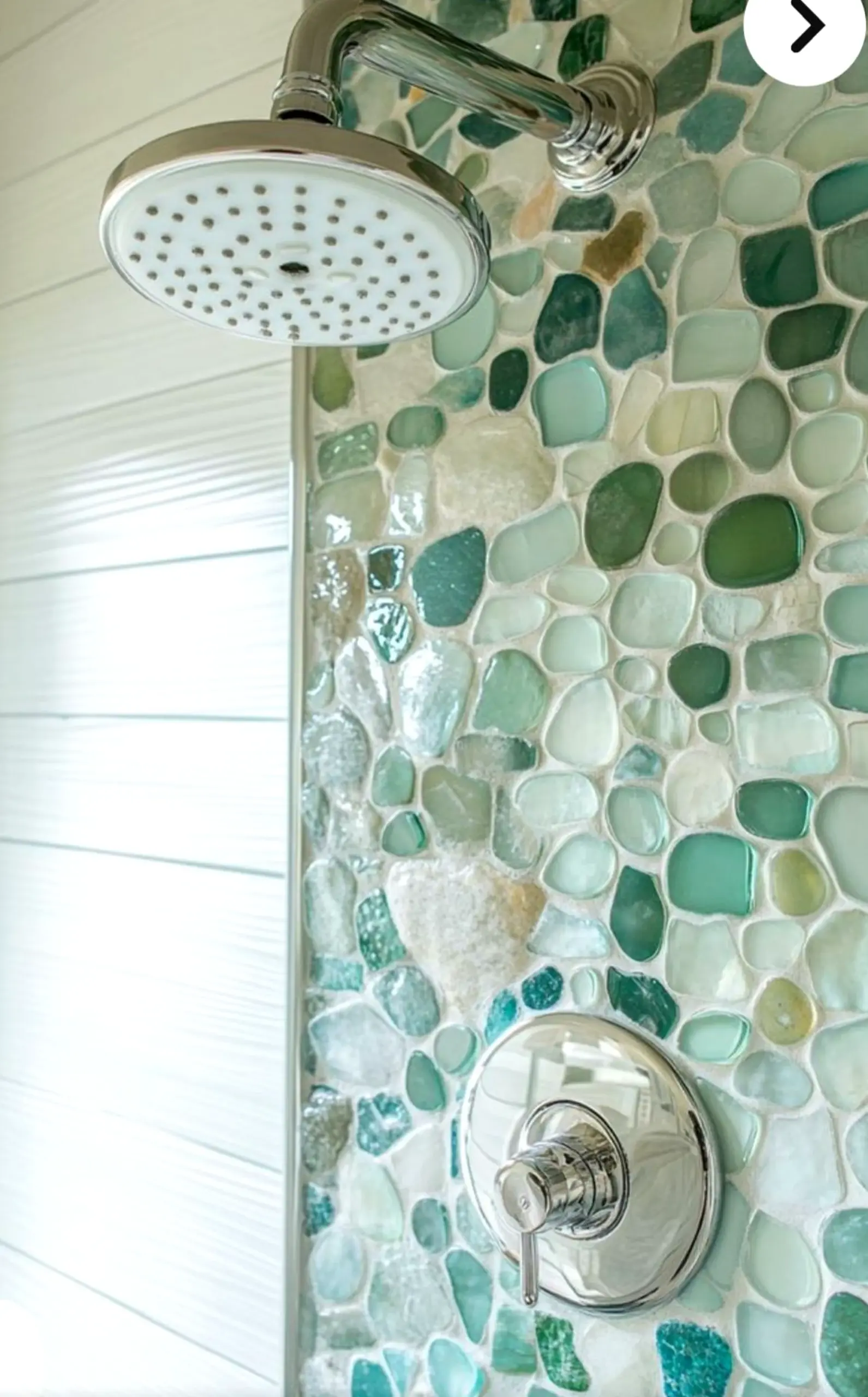 Textured bathroom vanity brings focus to the entry, creating a mood that feels fresh and intentional.