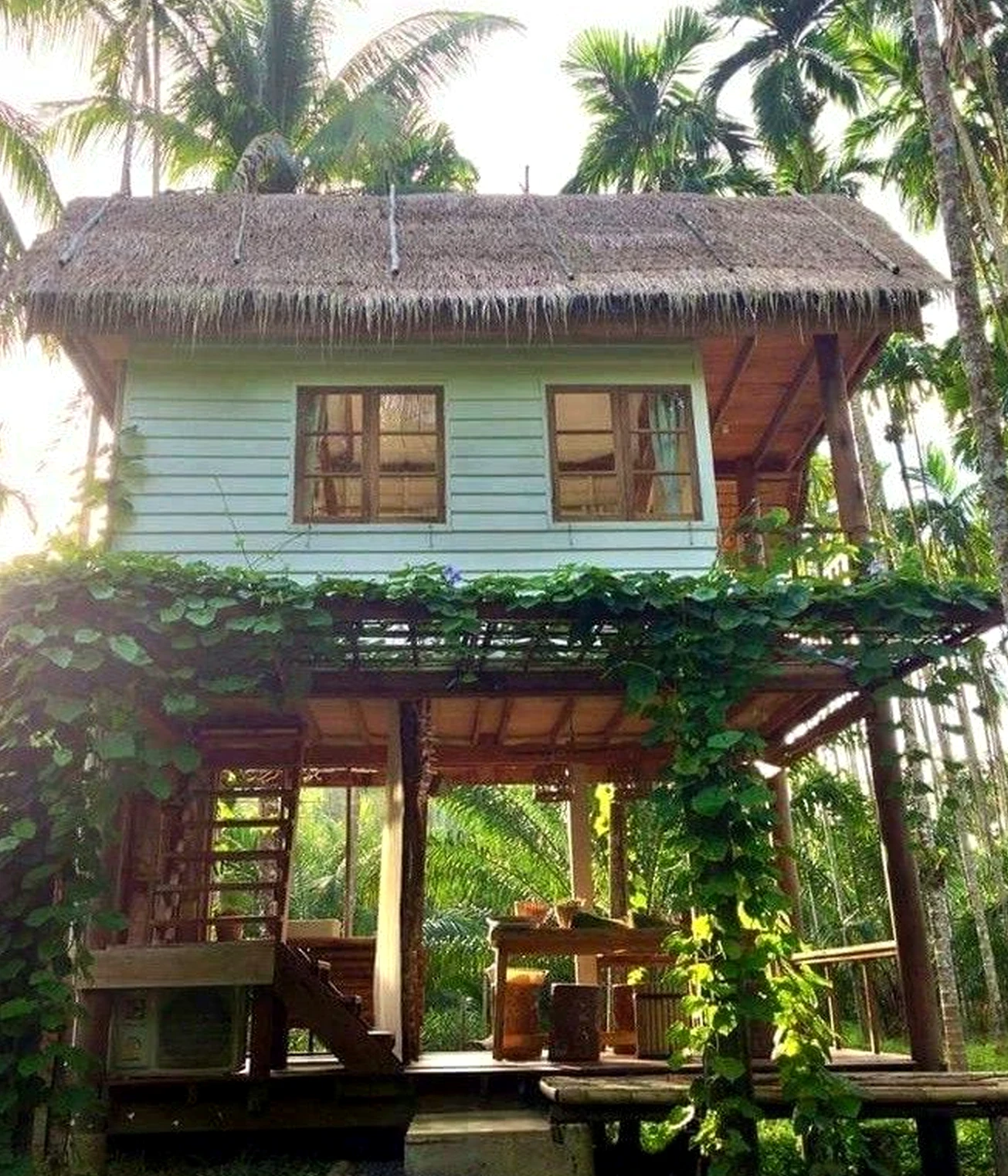 Simple vase display brings ease to the room, creating a mood that feels personal and relaxed.