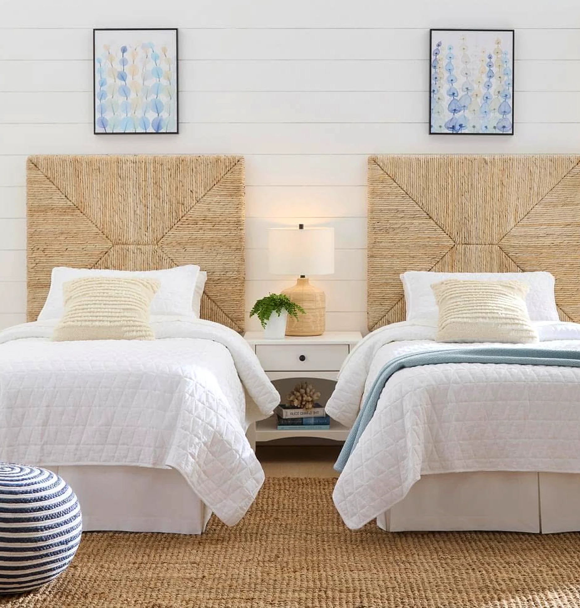 Natural bedside layer supports the table through shape, leaving the space feeling simple yet expressive.