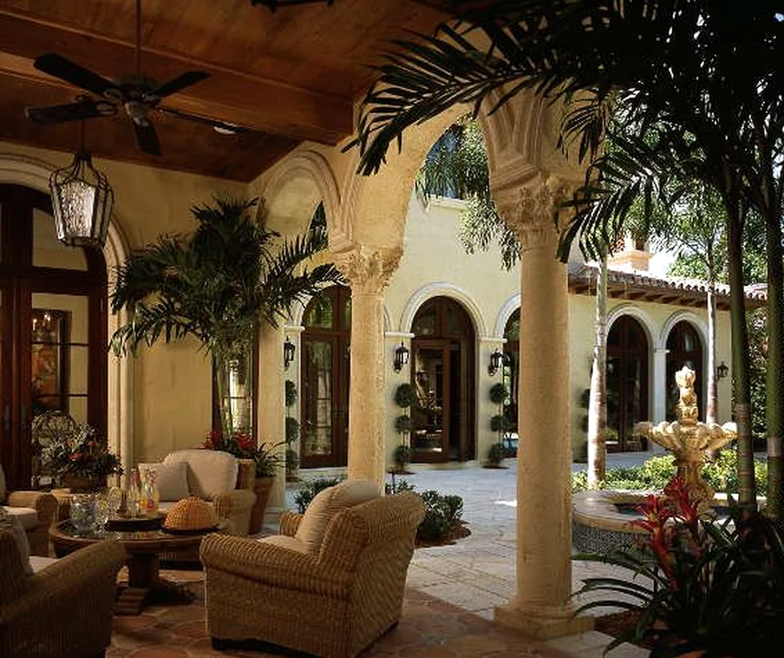 Colorful arched doorway anchors the view with detail, giving the view a mood that feels simple yet expressive.