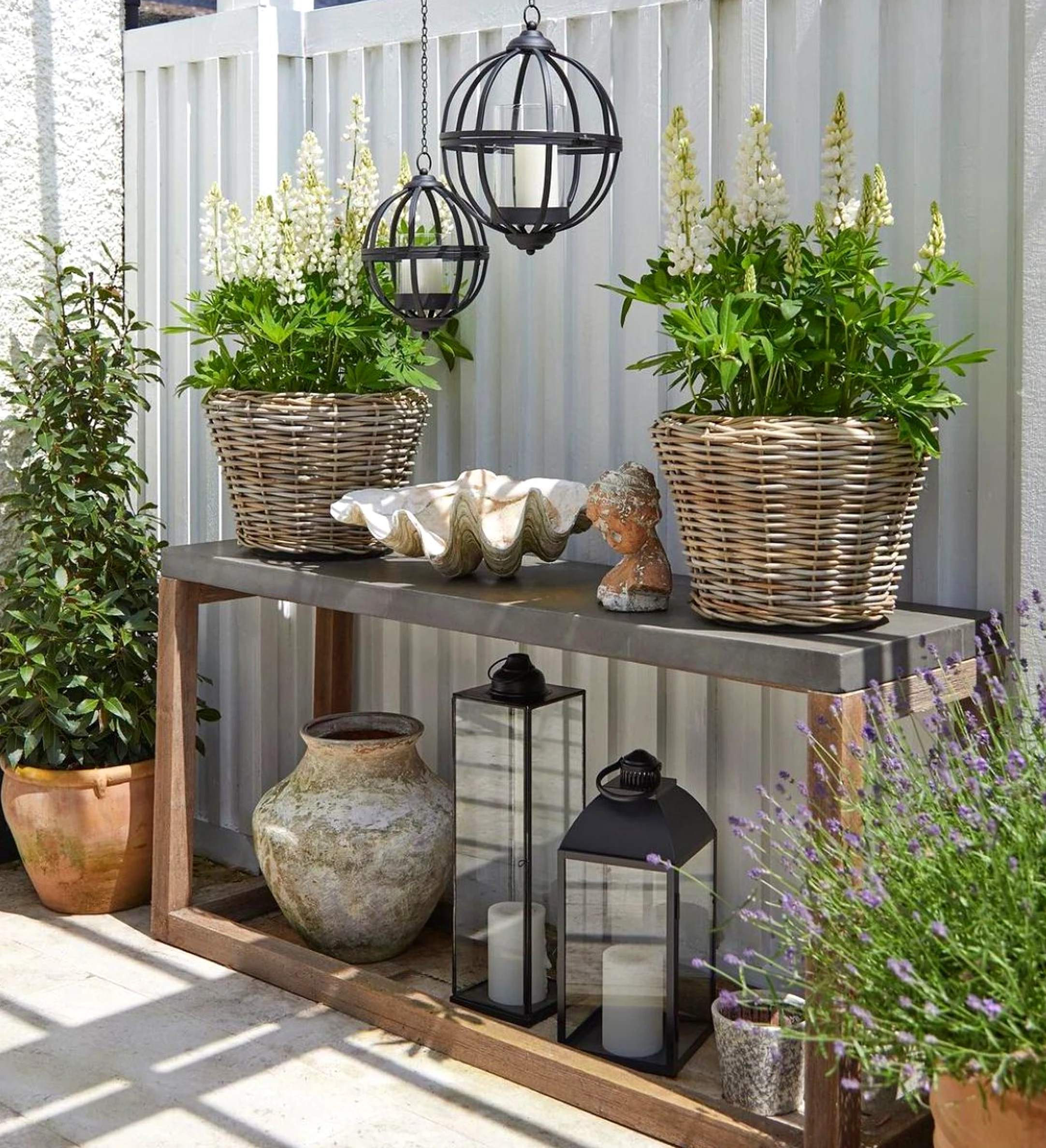 Natural woven chair brings a useful note of character, making the design feel easy to enjoy.
