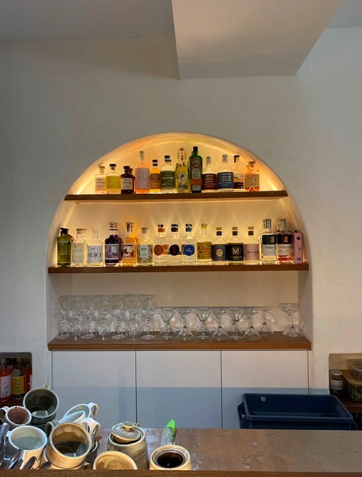Earthy greenhouse corner adds warmth across the corner, giving the decor a finish that feels settled and welcoming.