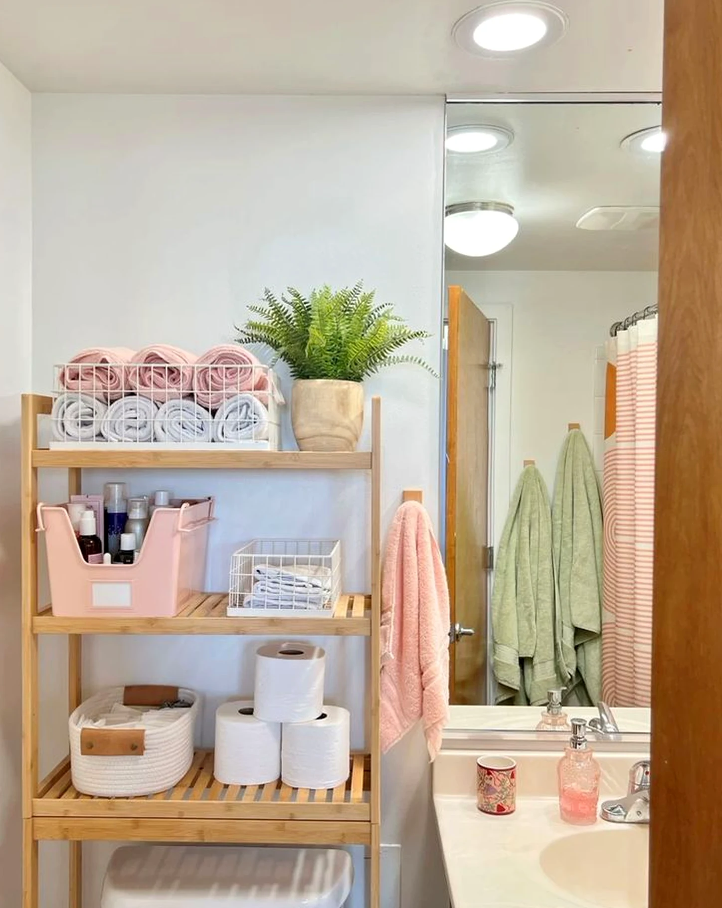 Warm greenhouse corner brings character to the wall, creating a mood that feels comfortable in daily use.