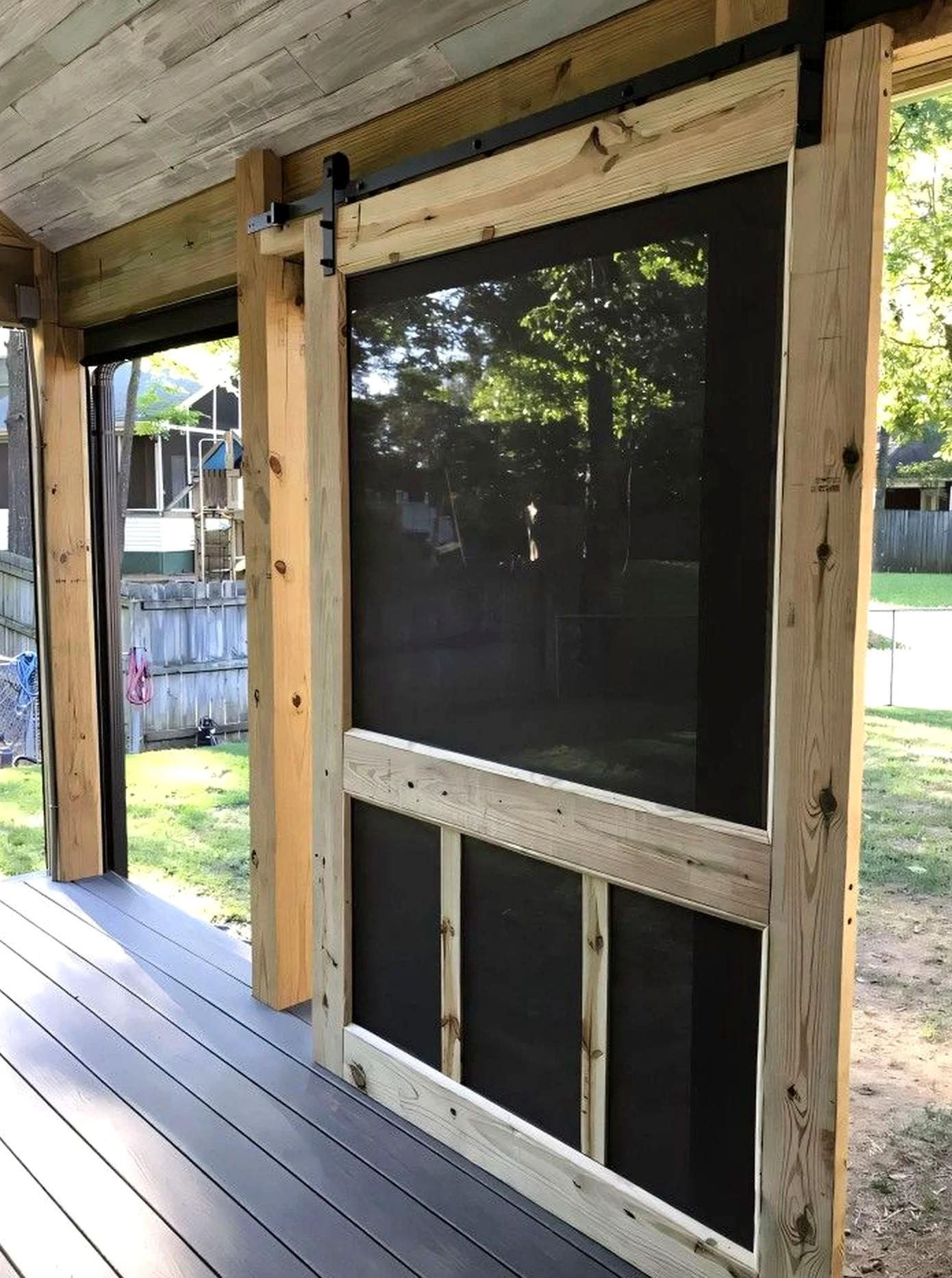 Subtle painted door adds a clear layer of softness, helping the entry feel pleasantly composed.
