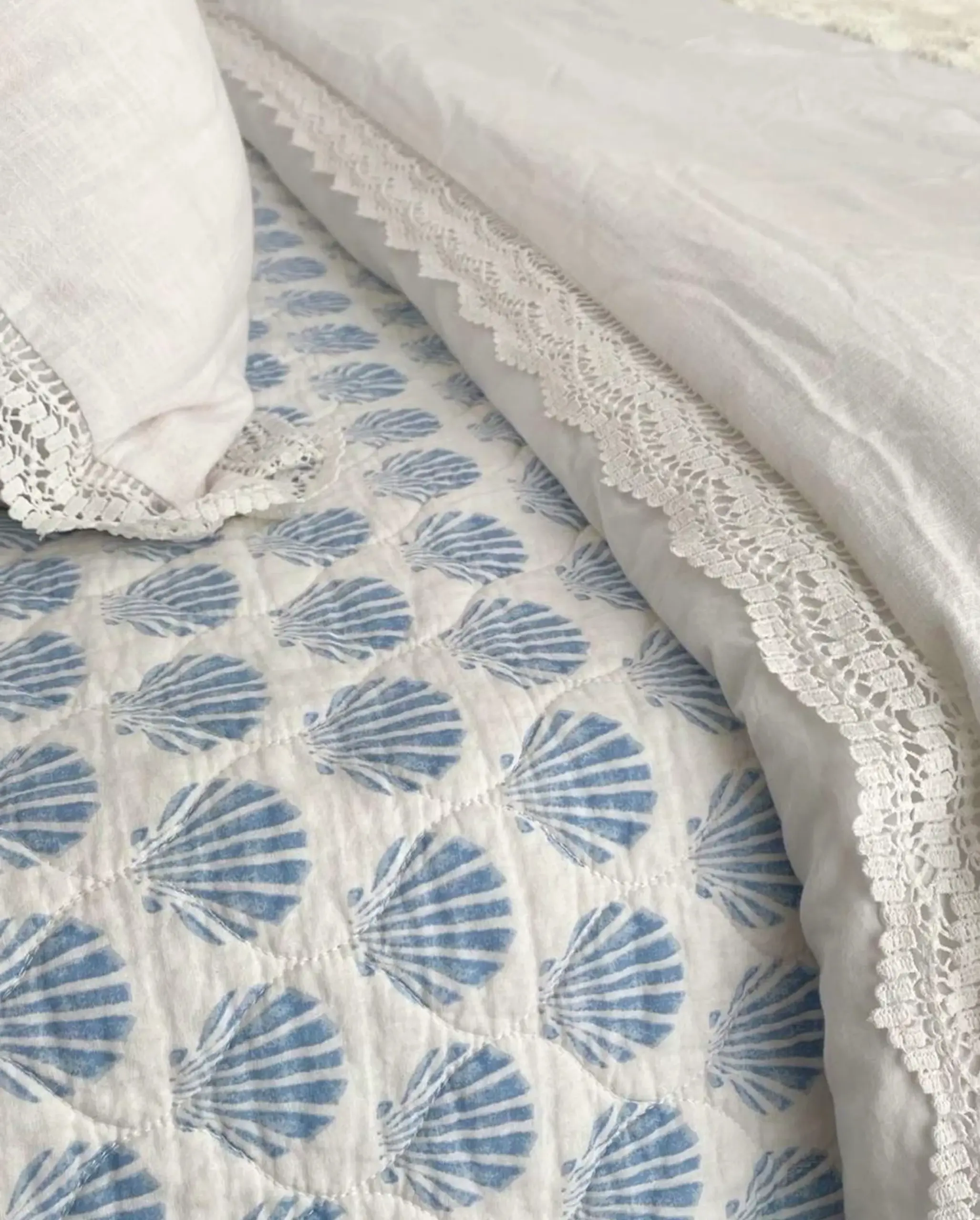 Subtle poolside setting brings a useful note of detail, making the garden edge feel easy to enjoy.